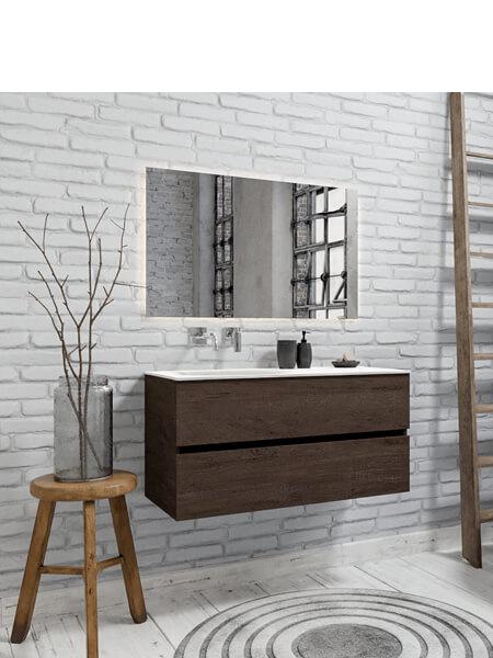 Mueble de baño suspendido Vica 100 Wood nogal 2 cajones en acabado Wood nogal mate. Un mueble de baño de apertura suave por uñero con encimera para grifo empotrado y seno izquierda.