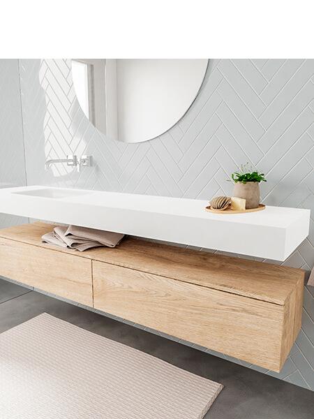 Mueble con lavabo suspendido cajones madera