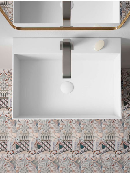 Lavabo Solid Surface Mendes con repisa para grifo en un baño moderno