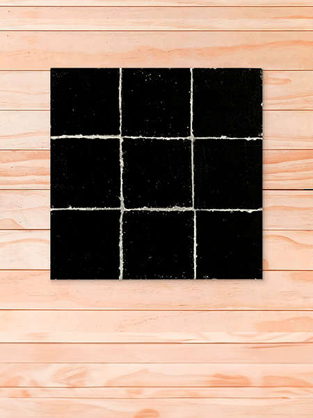 Descubre el Azulejo Zellige CZ228 negro: arte marroquí en cada pieza de 10x10x1 cm.