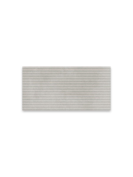 Revestimiento porcelánico gris con relieve lineal efecto listones