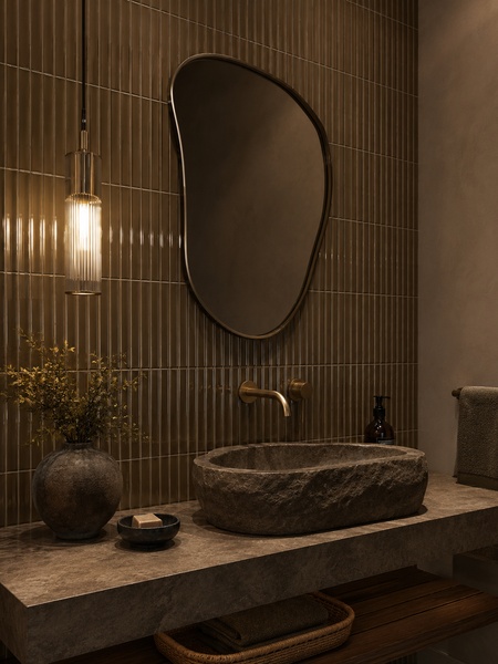 Revestimiento cerámico Waikiki Marrón Surf en baño moderno con lavabo de piedra y acabado brillo