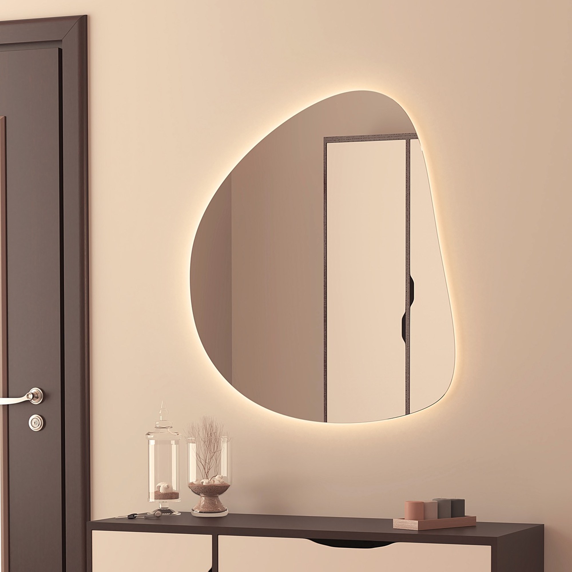 Espejo de baño Pedra 70x80 cm forma orgánica Doble TOUCH para luz bi-led (3 tonos de luz en el mismo espejo) y antivaho. 1 Espejo de bano Pedra de forma organica con luz ambiental encendida sobre un mueble